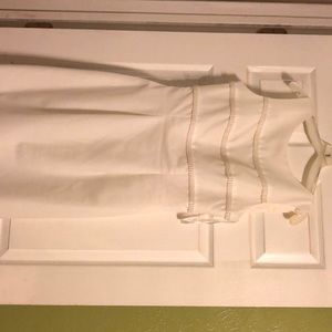 Wedding dress pearl application / David’s Bridal